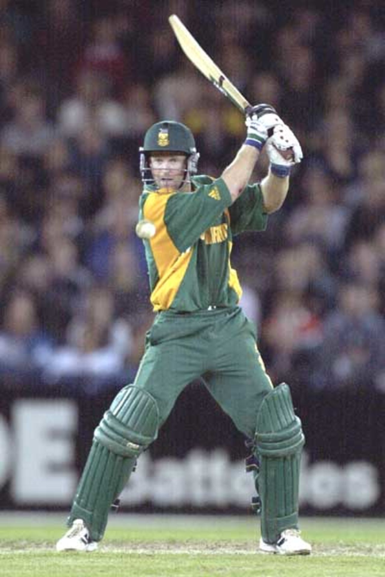 18 Aug 2000: Jonty Rhodes of South Africa hits one away in the match between Australia and South Africa, in game two of the Super Challenge 2000 played at the Colonial Stadium, Melbourne, Australia.