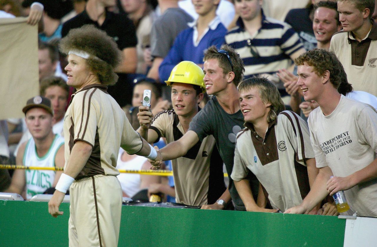 Hamish Marshall shakes the hand of a member of the "beige brigade" dressed for the occasion, New Zealand v Australia, Twenty20, Eden Park, February 17, 2005