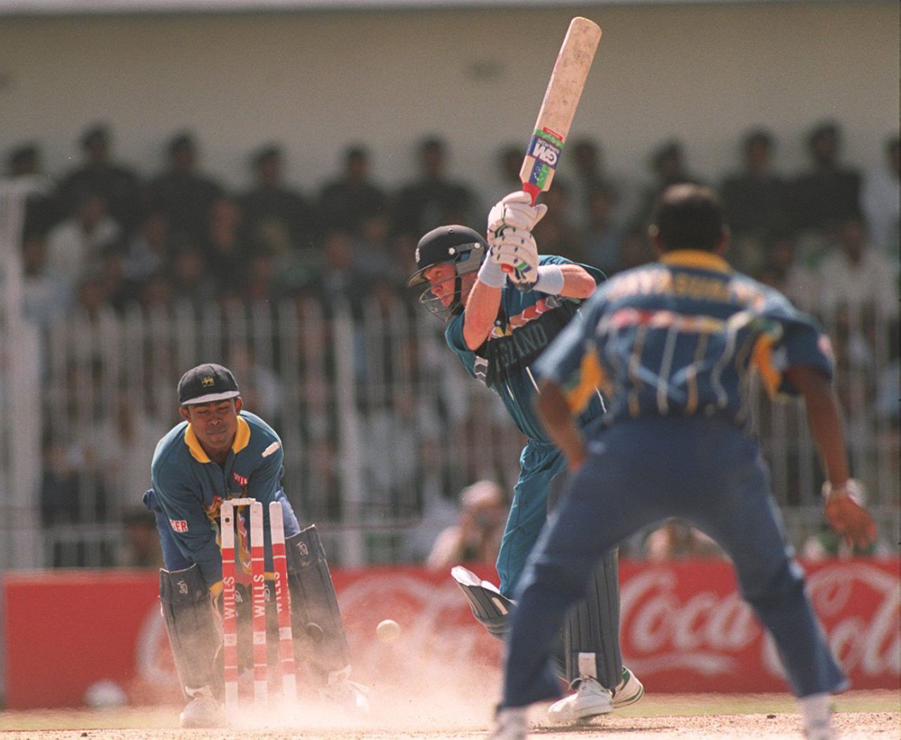 Dermot Reeve misses the ball after making room to hit through the off side, Sri Lanka v England, Quarter-final, World Cup, March 9, 1996, Faisalabad