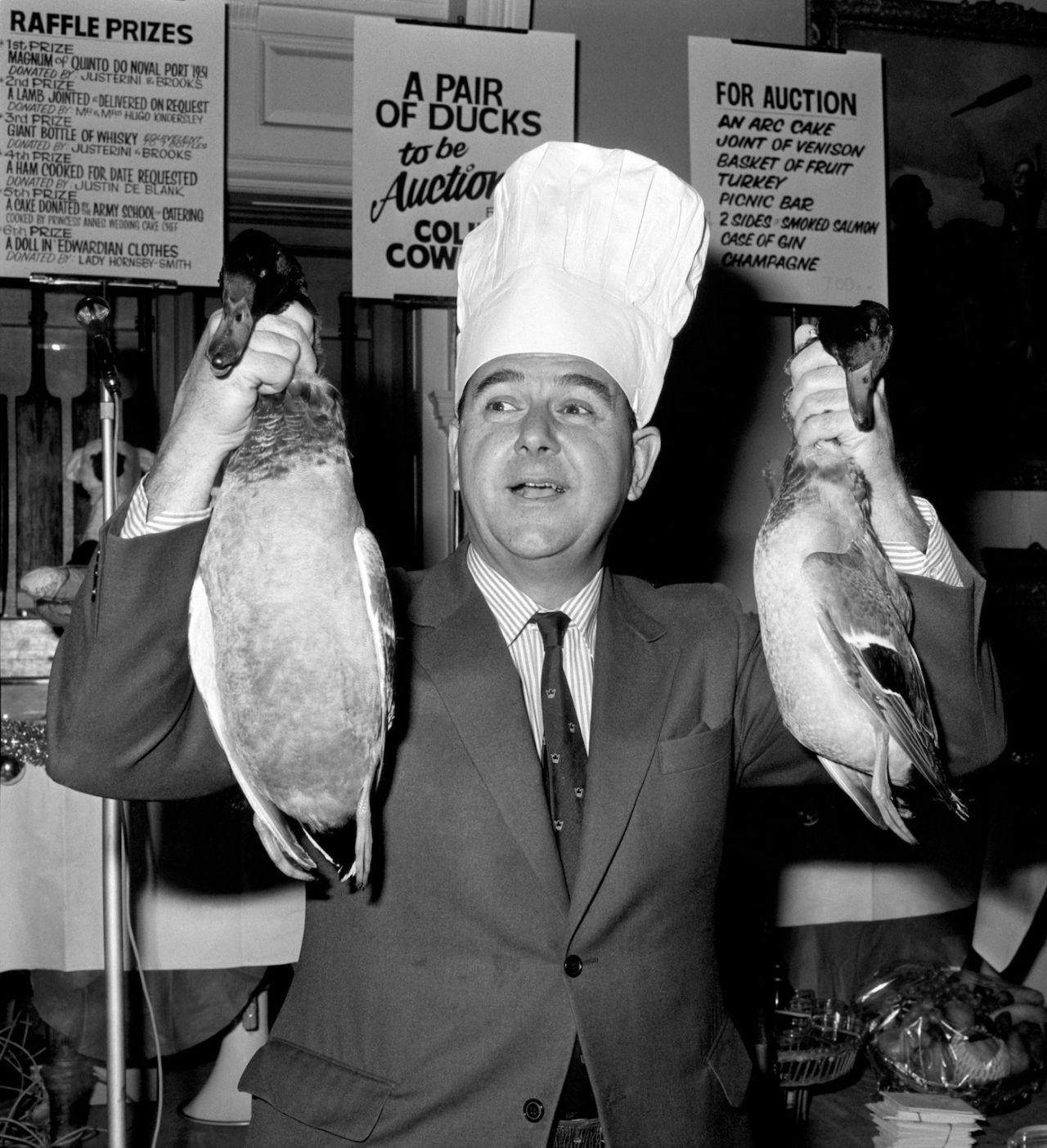 Colin Cowdrey auctions a pair of ducks at the 'Gourmet Food Fair' on behalf of the Arthritis and Rheumatism Council, Lords, November 14, 1974