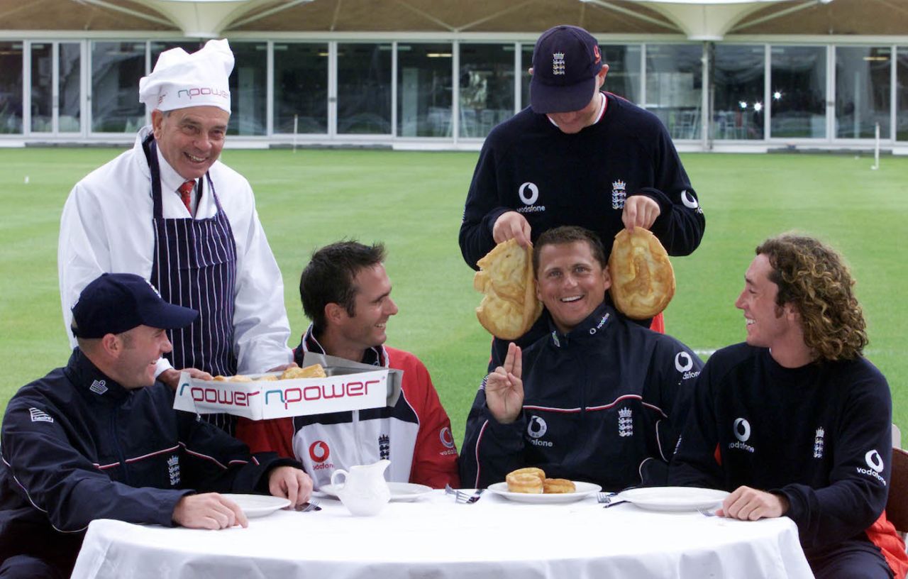 Dickie Bird serves Yorkshire puddings to Yorkshire's five England squad players Craig White, Michael Vaughan, Darren Gough, Matthew Hoggard (standing) and Ryan Sidebottom, Lord's indoor cricket school, May 16, 2001