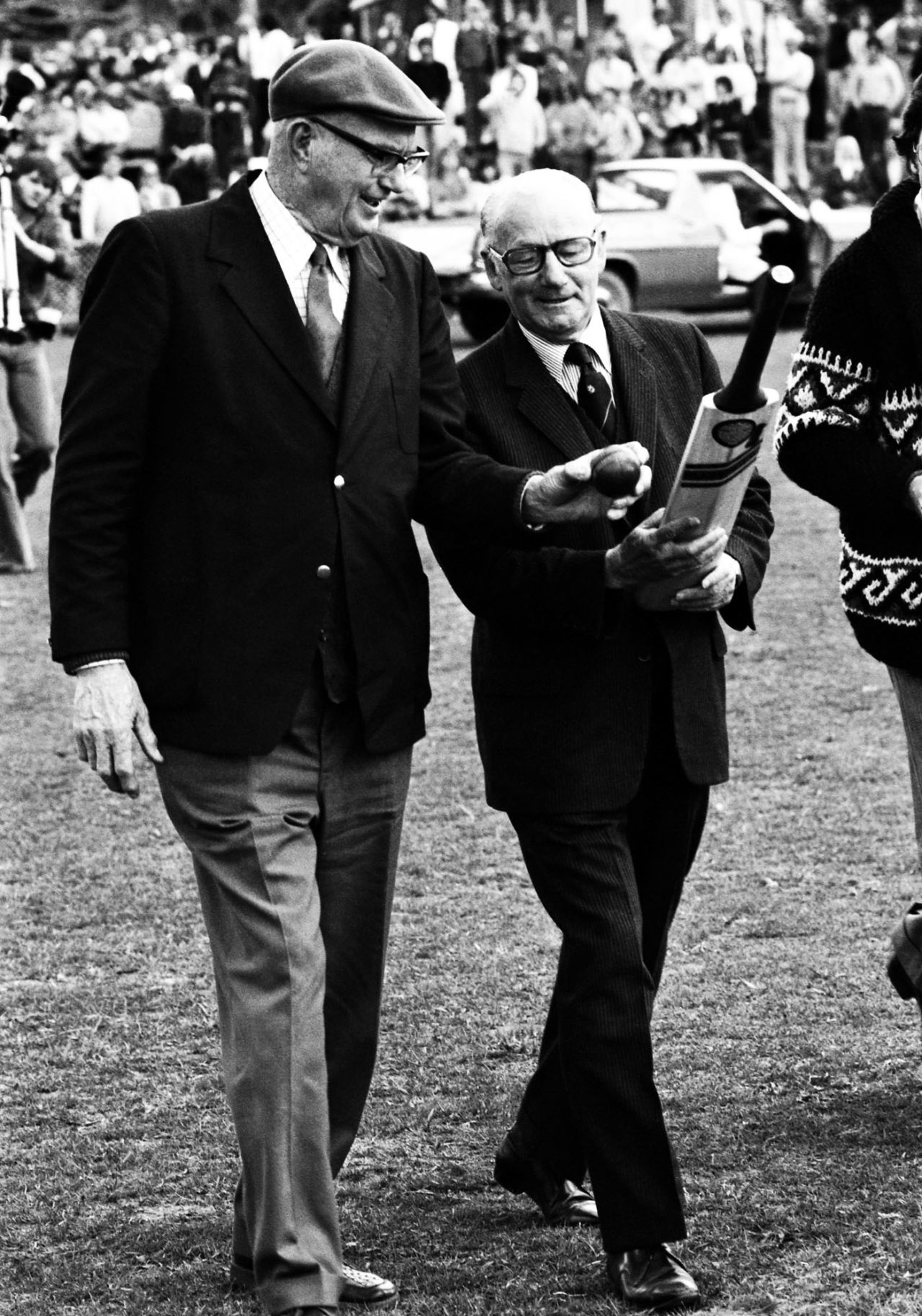 Bill O'Reilly and Don Bradman walk onto the pitch during the reopening of the Bradman Oval in Bowral, September 4, 1976
