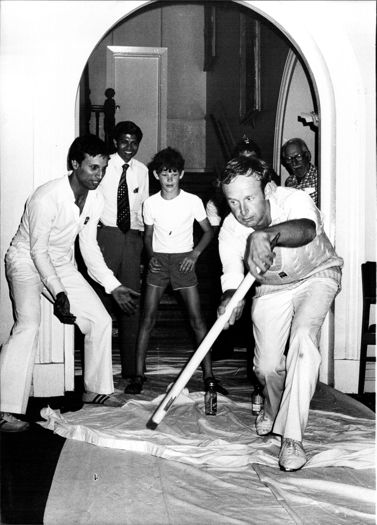 Derek Underwood bats while Asif Iqbal fields at slip and a young James Packer keeps wicket in a game of corridor cricket during a rain delay, WSC Australia v WSC World XI, 3rd day, World Series Cricket, Sydney, January 16, 1978