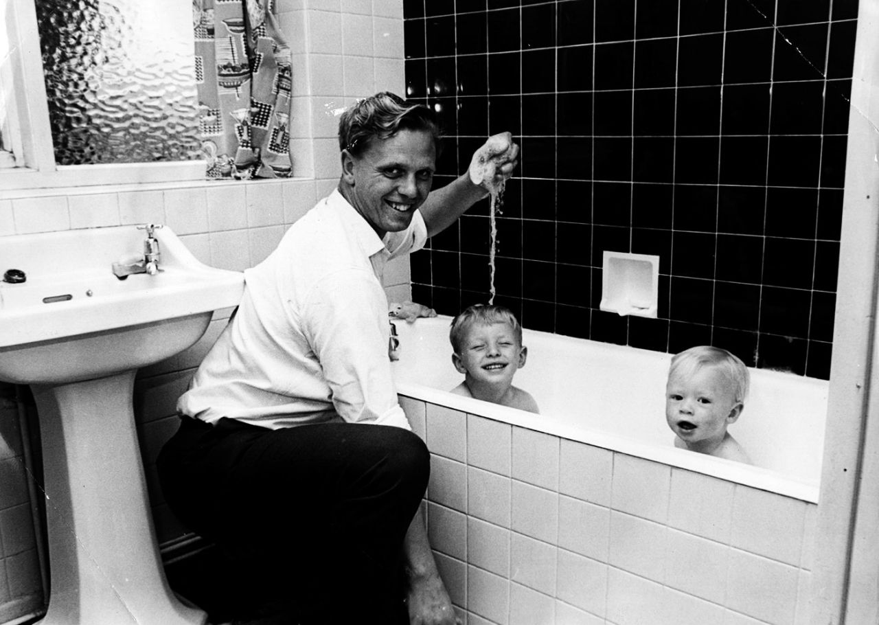 Ken Higgs gives his kids a bath, August 16, 1965