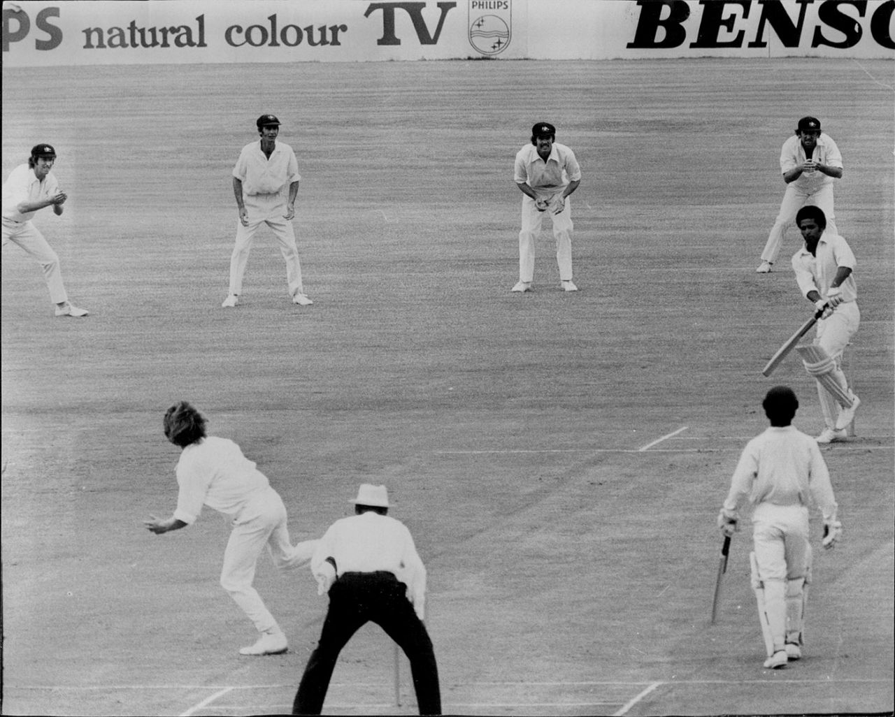 Bernard Julien tries to fend off a delivery from Jeff Thomson, 1975