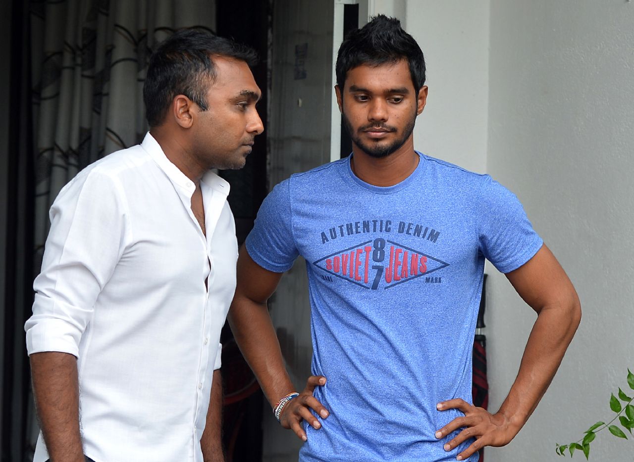 Mahela Jayawardene speaks to Dhananjaya de Silva following the murder of his father on the eve of the Sri Lanka team's departure for a tour of the West Indies, Colombo, May 25, 2018 