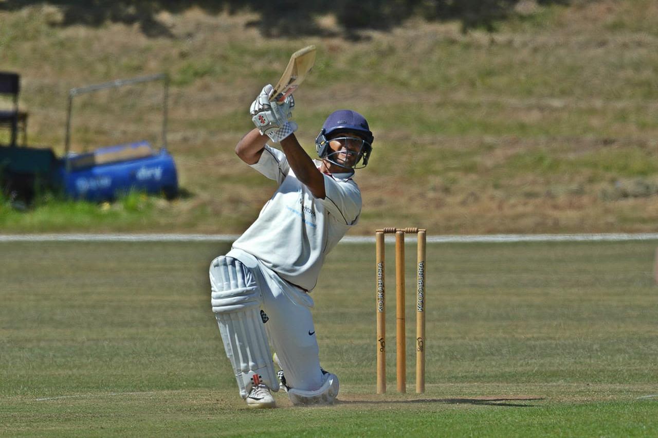 Virat Singh plays a lofted drive