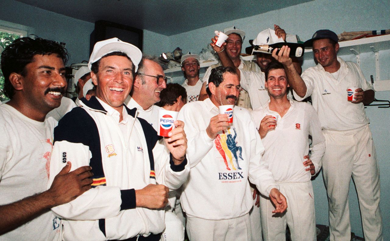 Nasser Hussain pours champagne over Graham Gooch during Essex's celebrations after they clinched the County Championship title, Essex v Middlesex, Chelmsford, 3rd day, September 19, 1991
