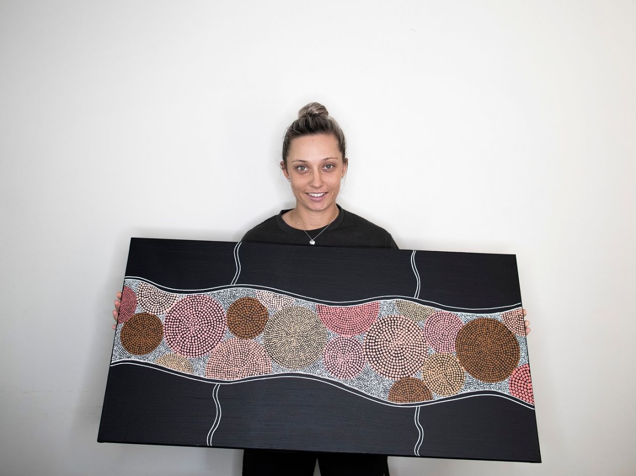 Ashleigh Gardner poses with her painting, Sydney, May 8, 2020