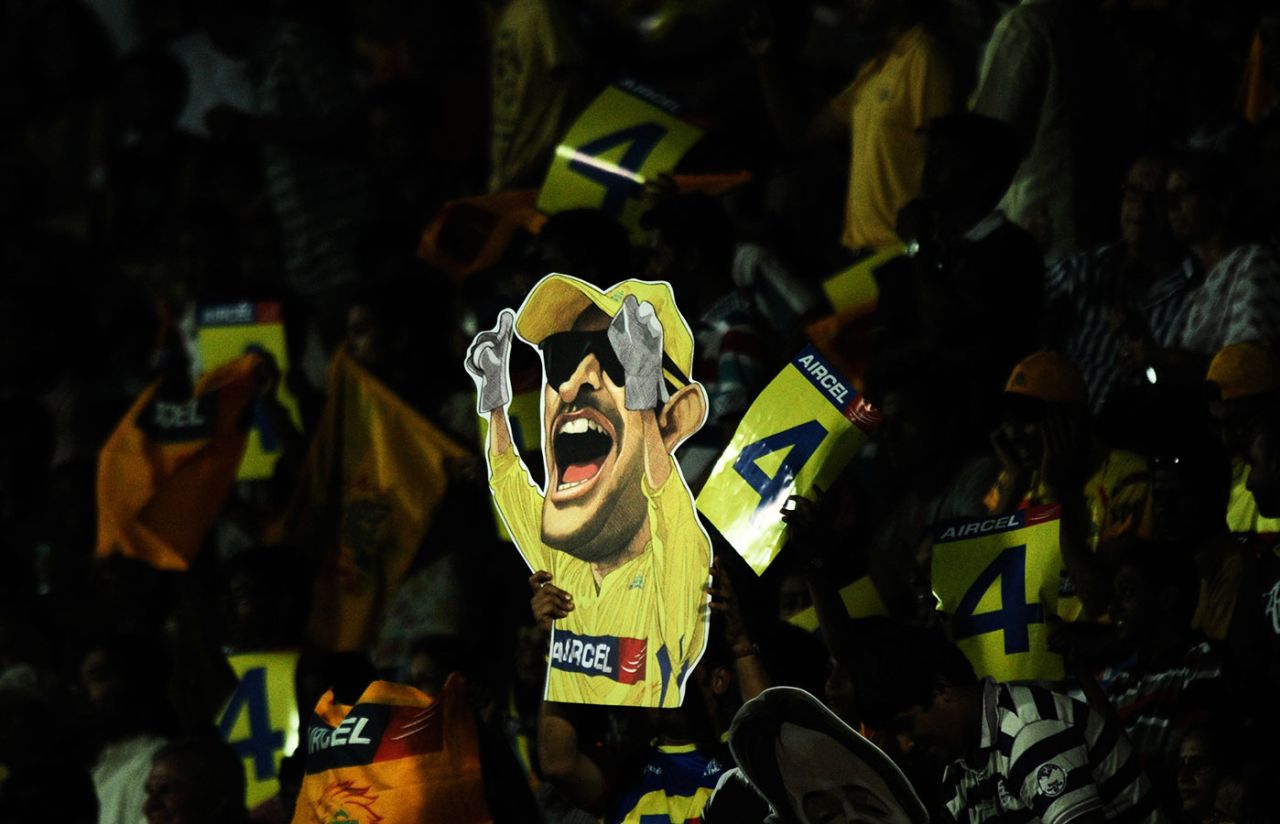 A spectator holds up a cutout of MS Dhoni, Chennai Super Kings v Deccan Chargers, IPL 2011, Chennai, May 1, 2011