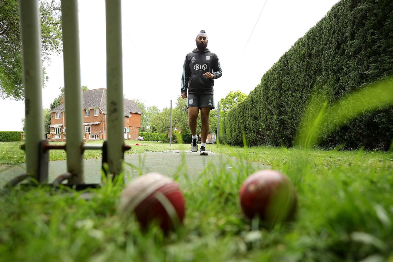 Amar Virdi, the Surrey and England Lions spinner, trains at his home