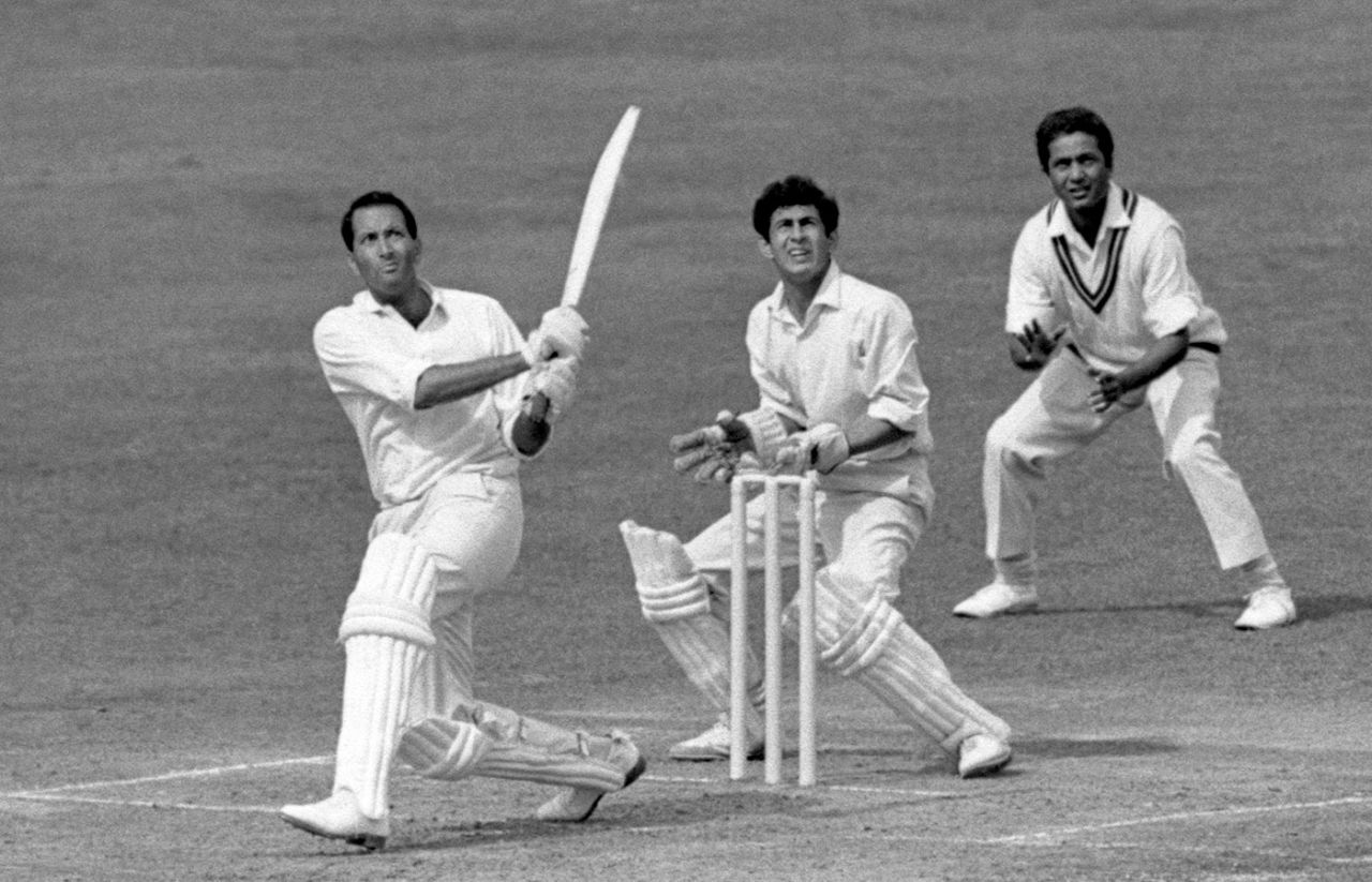 Basil D'Oliveira lofts the ball to the boundary, watched by Pakistan wicketkeeper Wasim Bari, second day, first Test, England v Pakistan, Lord's, July 28, 1967