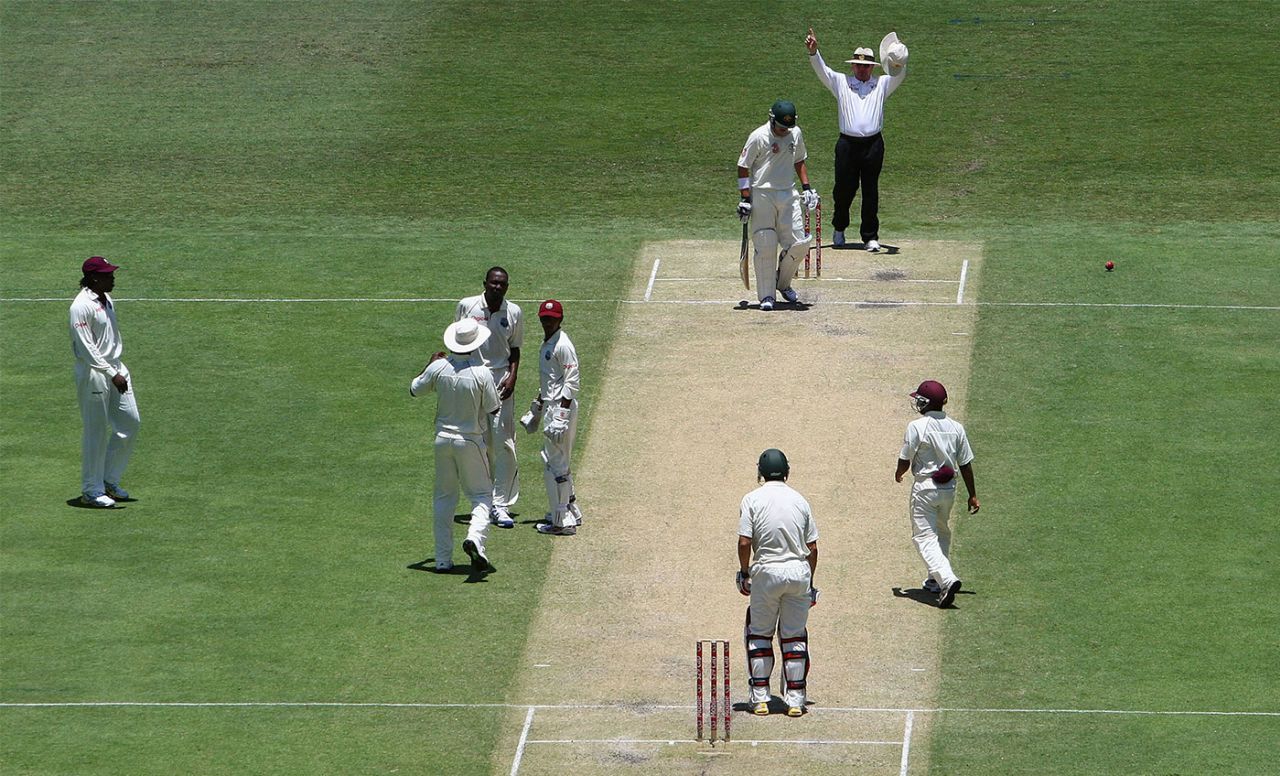 The West Indies players congratulate Ravi Rampaul on his first Test wicket, Australia v West Indies, 1st Test, Brisbane, 2nd day, November 27, 2009
