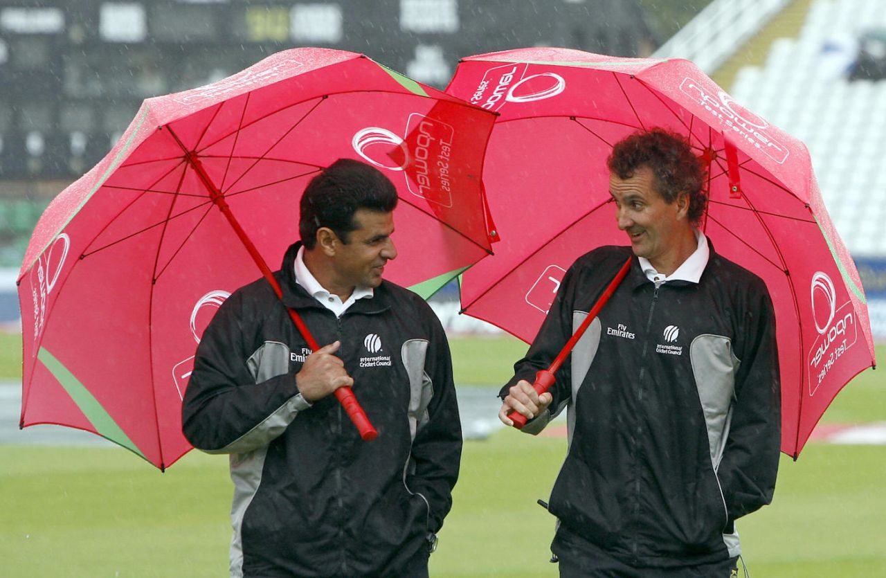 Aleem Dar (left) and Billy Bowden leave the pitch after an inspection, fourth Test, England v West Indies, Riverside, Durham, June 15, 2007