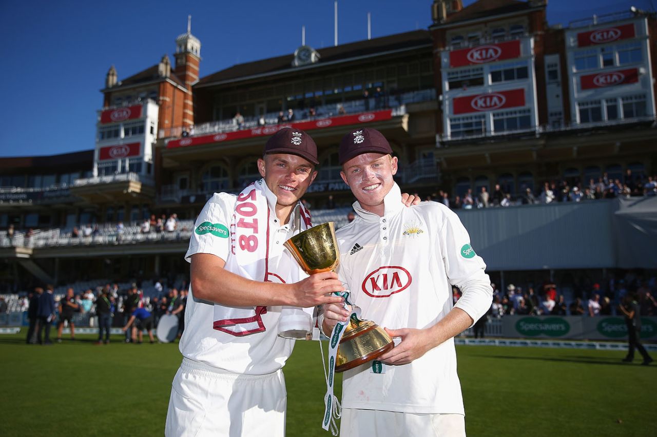 Sam Curran and Ollie Pope celebrate the County Championship title win, Day Four, Surrey v Essex, at The Oval, in London, England, September 27, 2018