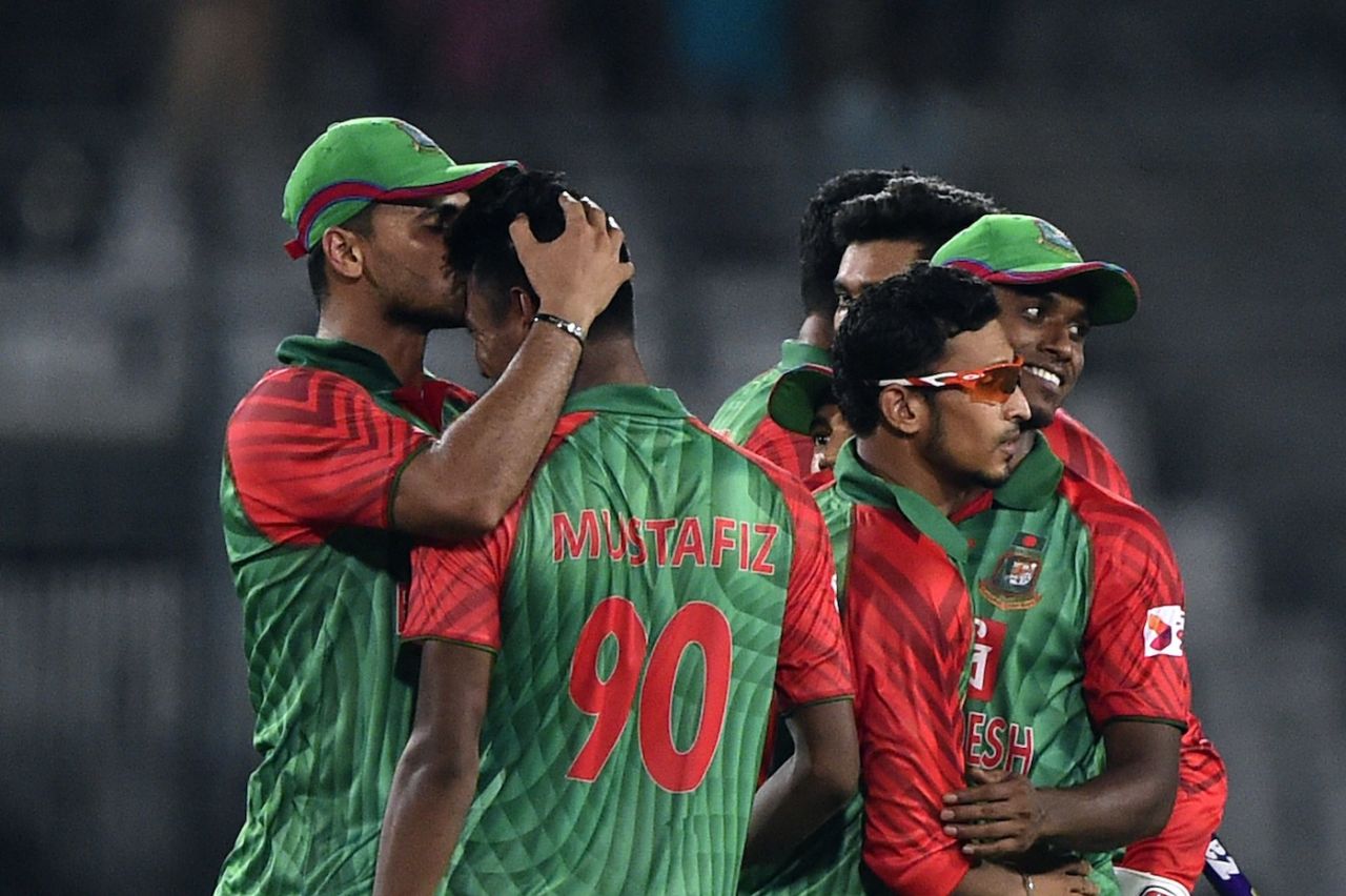 Mashrafe Mortaza congratulates Mustafizur Rahman after winning the first ODI, Bangladesh v India, Sher-e-Bangla Stadium, Dhaka, June 18, 2015