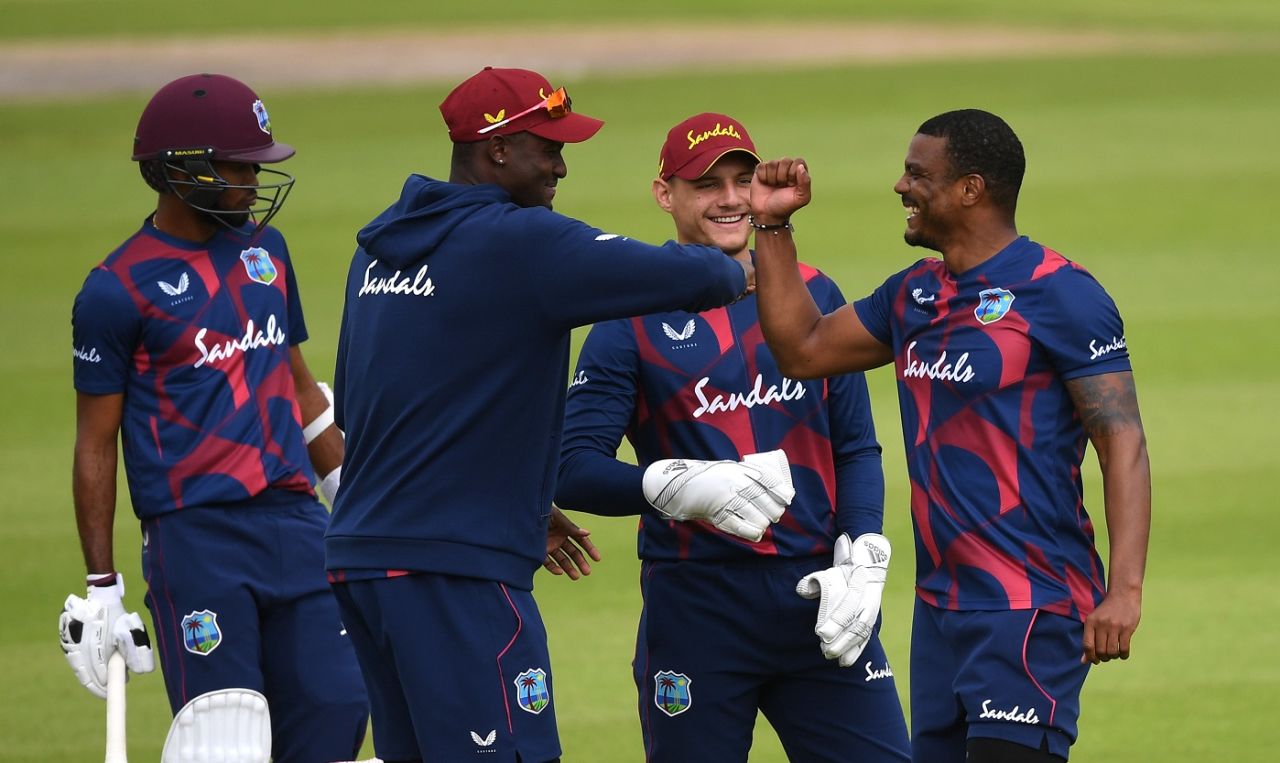Jason Holder and Shannon Gabriel fist bump during the intra-squad warm-up match, Old Trafford, Manchester, June 23, 2020