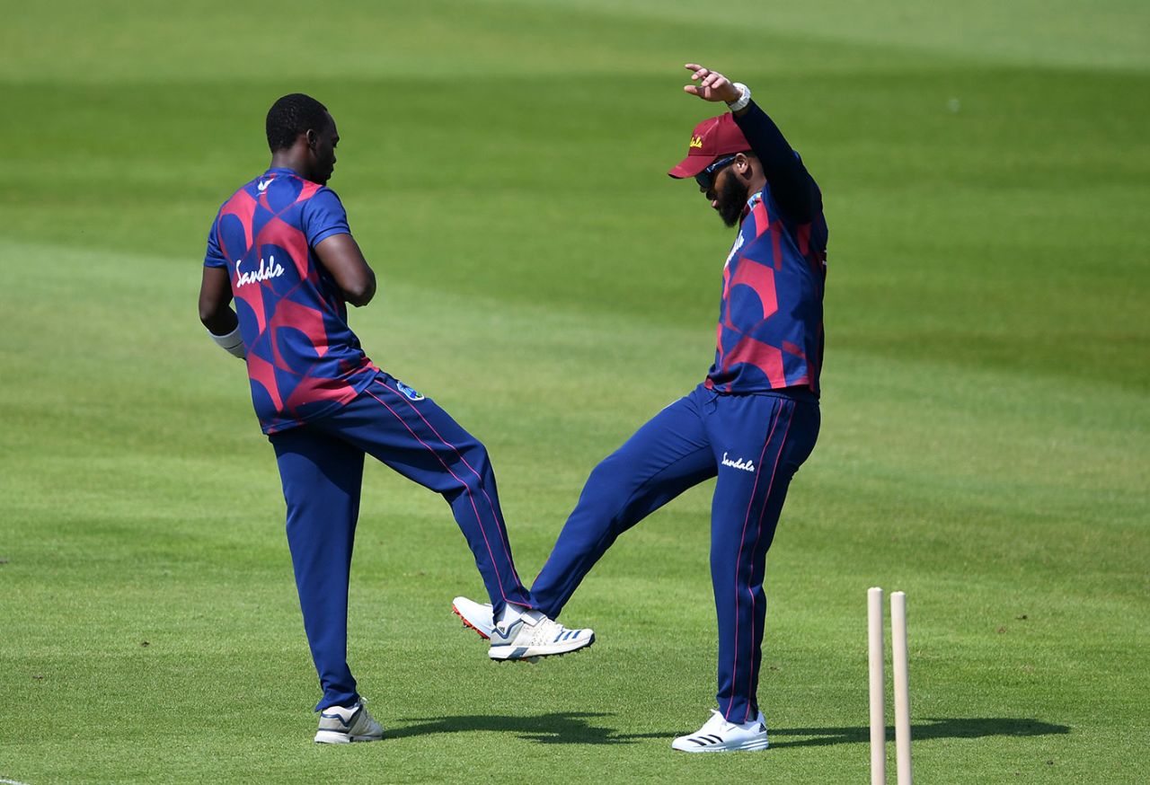 Marquino Mindley celebrates with John Campbell after claiming the wicket of Jermaine Blackwood during day two of the intra-squad warm-up, Old Trafford, Manchester, June 24, 2020