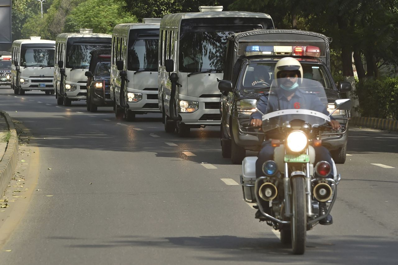 The Pakistan team buses being escorted to the airport in Lahore, as their tour of England kicks off, June 28, 2020