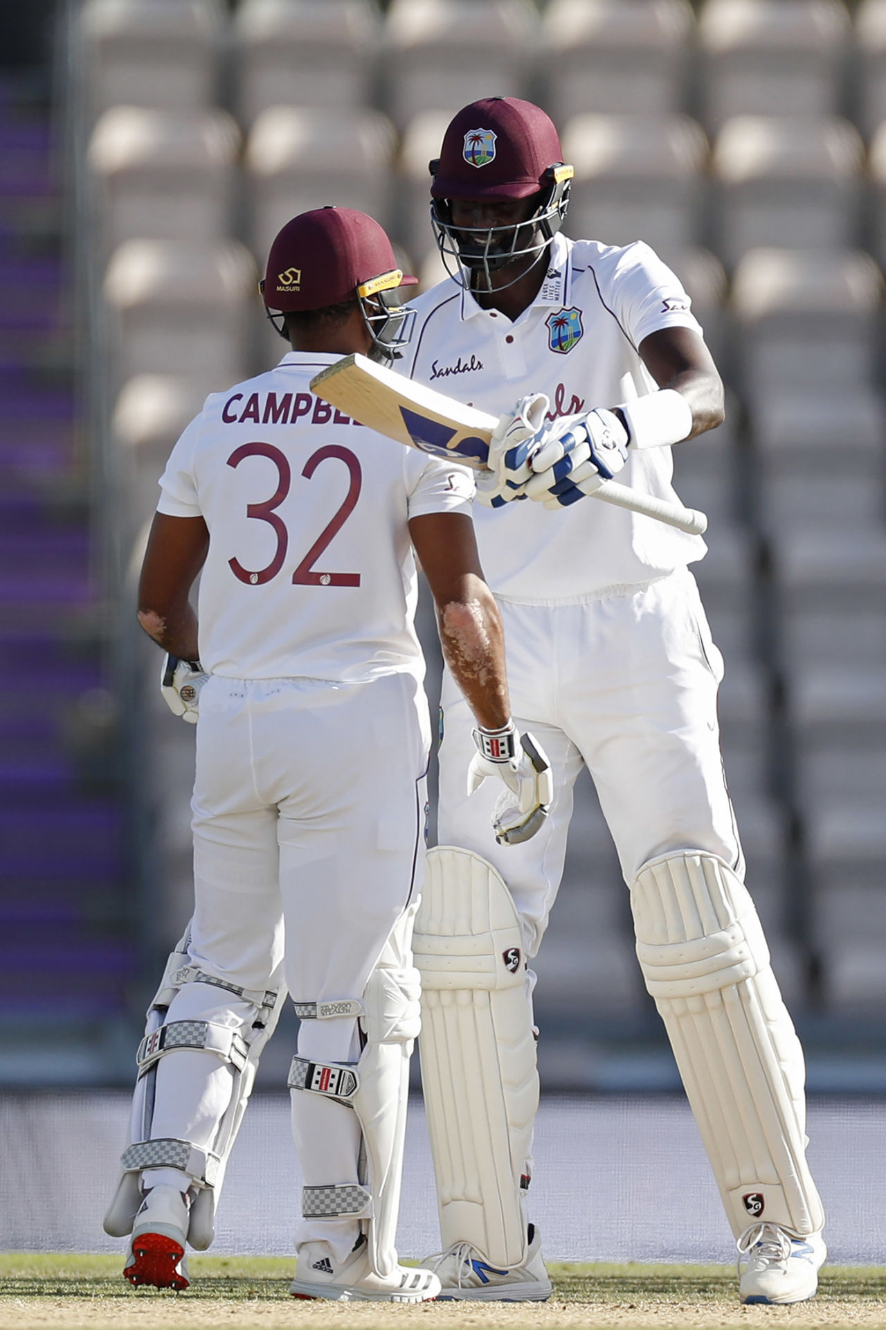 Jason Holder and John Campbell celebrate victory, England v West Indies, 1st Test, 5th day, Southampton, July 12, 2020