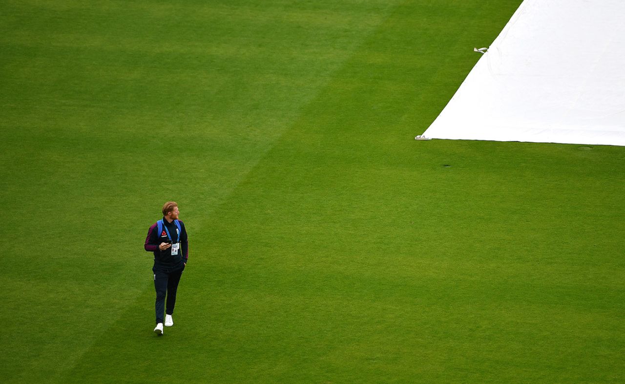 Ben Stokes walks across the outfield on a washed out third day at Emirates Old Trafford, England v West Indies, 2nd Test, Emirates Old Trafford, 3rd day, July 18, 2020