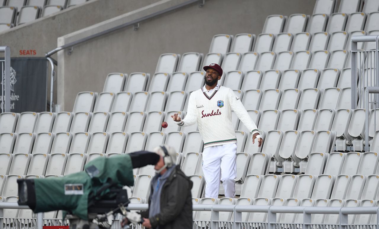 Roston Chase retrieves a ball from the stands after Ben Stokes' six, England v West Indies, 2nd Test, Emirates Old Trafford, 5th day, July 20, 2020