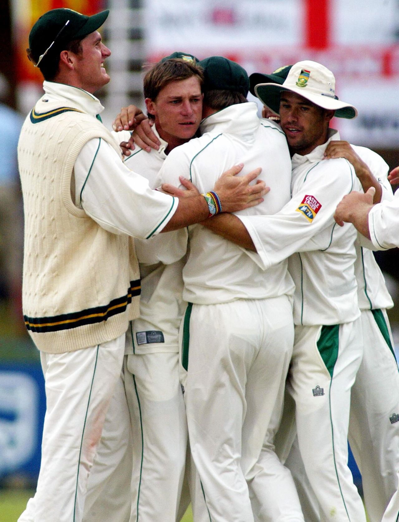Team-mates congratulate Dale Steyn for Michael Vaughan's wicket, South Africa v England, 1st Test, Port Elizabeth, 4th day, December 20, 2004