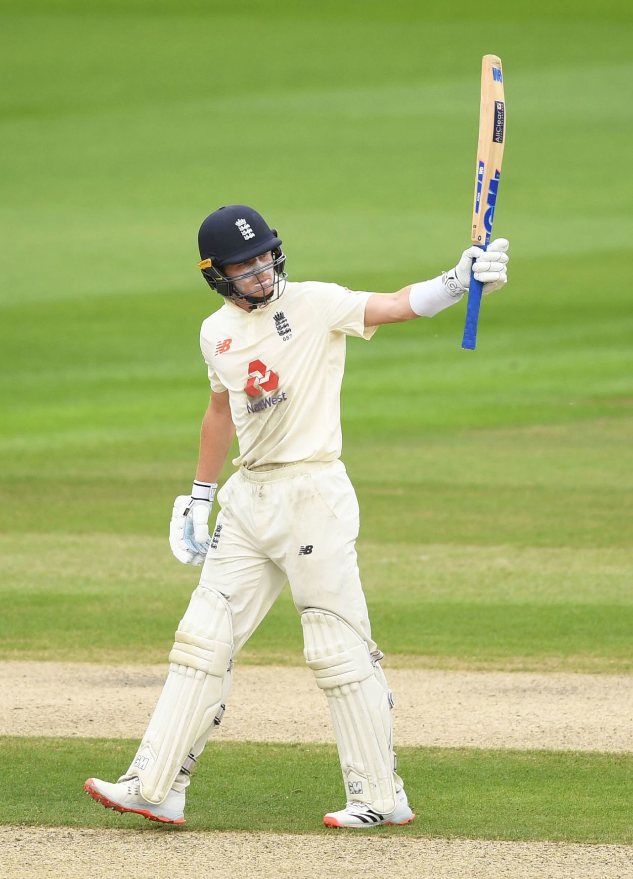 Ollie Pope acknowledges his half-century, England v West Indies, 3rd Test, Emirates Old Trafford, 1st day, July 24, 2020