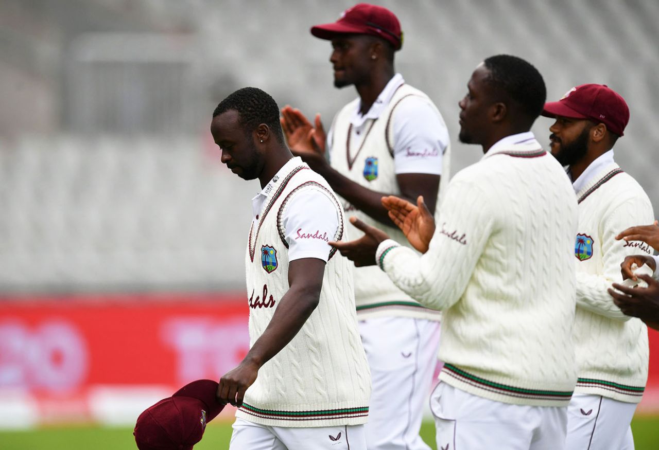 Kemar Roach is applauded by his team-mates as he walks off, England v West Indies, 3rd Test, Emirates Old Trafford, 2nd day, July 25, 2020