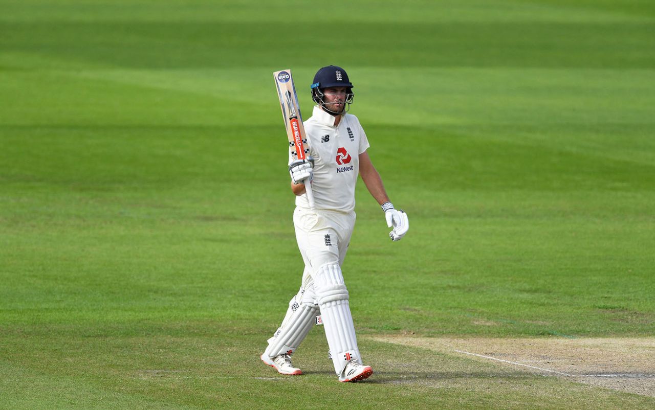 Dom Sibley raises his bat on reaching fifty, England v West Indies, 3rd Test, Emirates Old Trafford, 3rd day, July 26, 2020