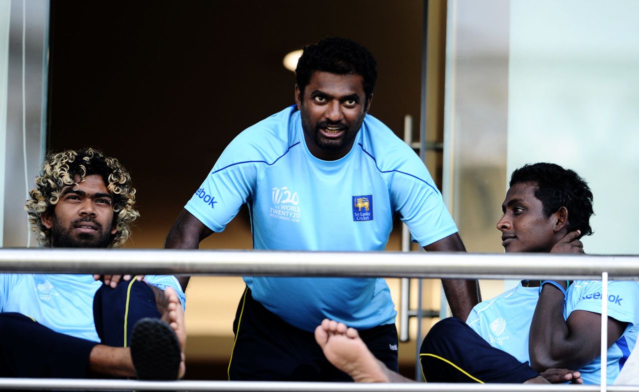 Lasith Malinga, Muttiah Muralitharan and Ajantha Mendis relax in the dressing room, Mumbai, March 31, 2011