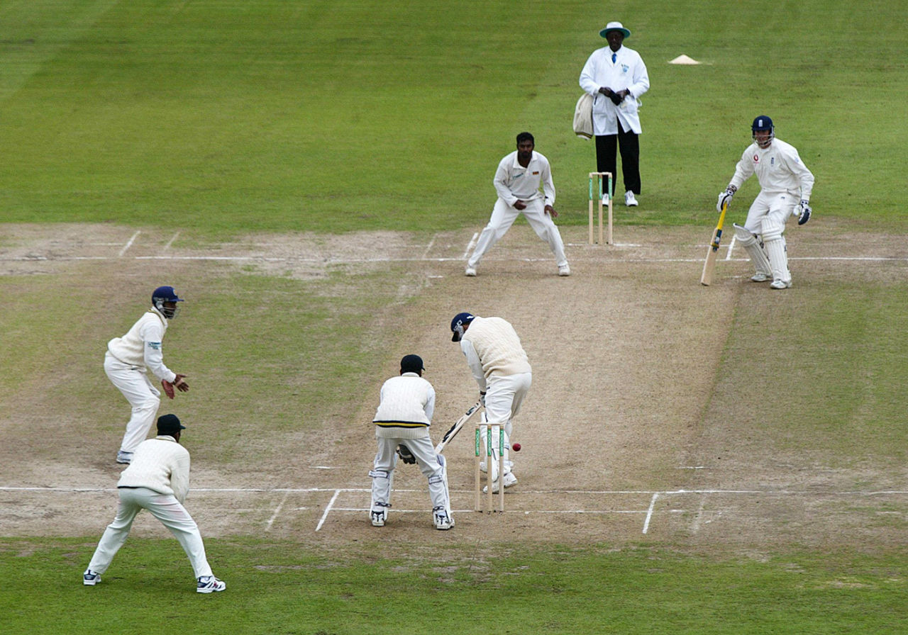 Muttiah Muralitharan watches as the ball misses Mark Butcher's stumps, England v Sri Lanka, Third Test, Old Trafford, 13 Jun 2002