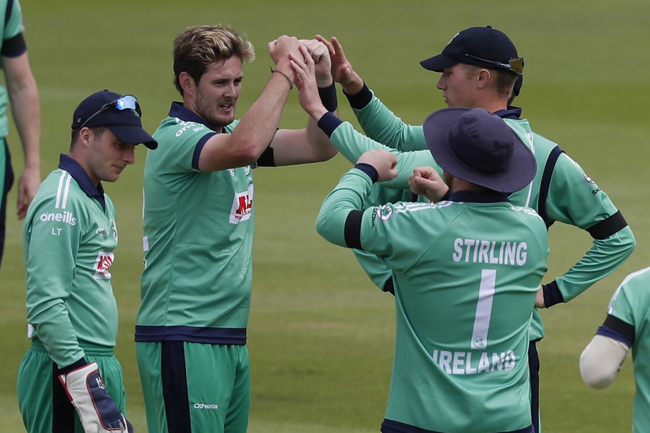 Mark Adair celebrates with teammates after bowling Jonny Bairstow, Ageas Bowl, August 4, 2020