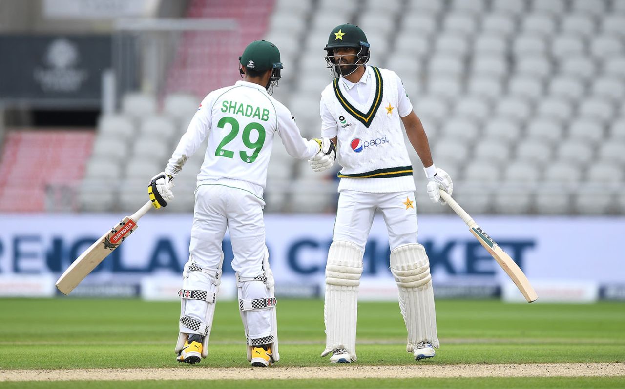 Shan Masood and Shadab Khan shake hands, England v Pakistan, 1st Test, Old Trafford, 2nd day, August 6, 2020