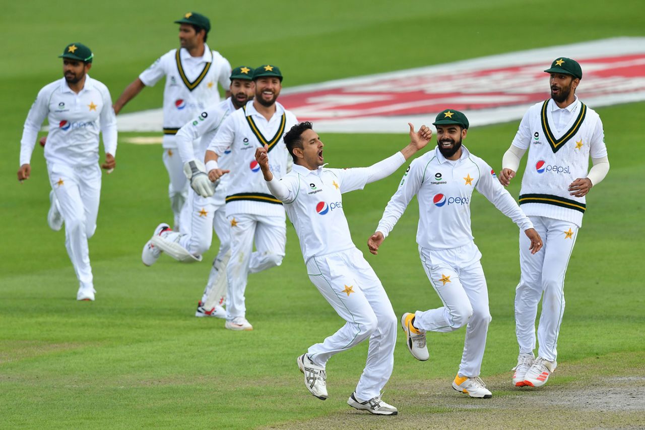 Mohammad Abbas is engulfed by his team-mates after bowling Ben Stokes, England v Pakistan, 1st Test, Old Trafford, 2nd day, August 6, 2020