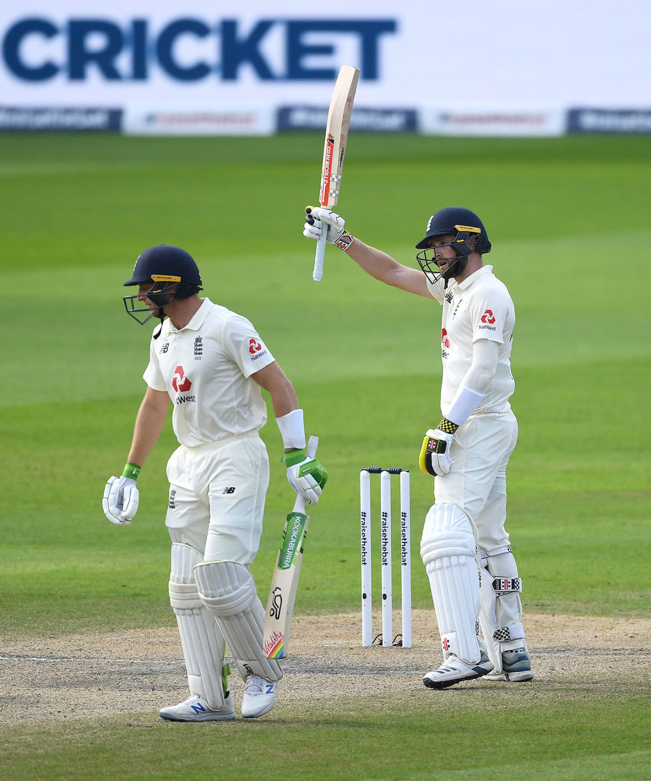 Chris Woakes reaches fifty in his stand with Jos Buttler, England v Pakistan, 1st Test, Old Trafford, 4th day, August 8, 2020