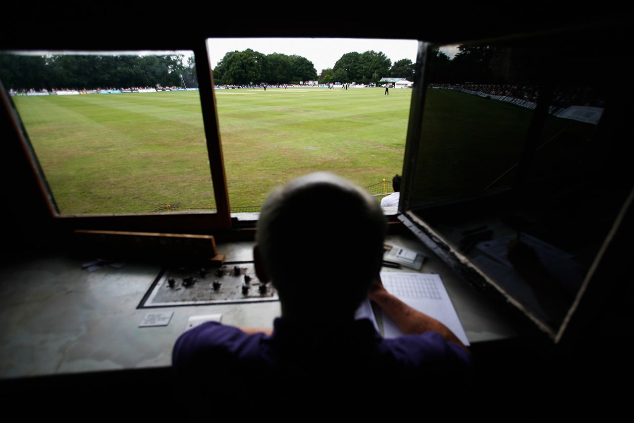 Scorer Alan James works during the Friends Life T20 match between Middlesex and Somerset, Southgate Cricket Club, London, July 10, 2011