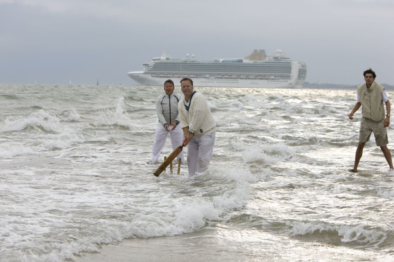 Members of the Island Sailing Club and the Royal Southern Yacht Club play cricket on The Brambles sand bank, Solent, United Kingdom, August 31, 2008