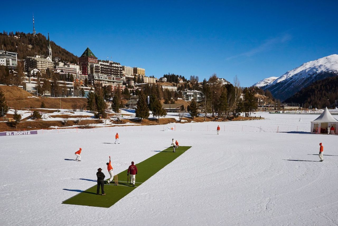 A bowler steams in during the 30th Cricket on Ice tournament held on the frozen Lake St. Moritz, Switzerland February 25, 2017