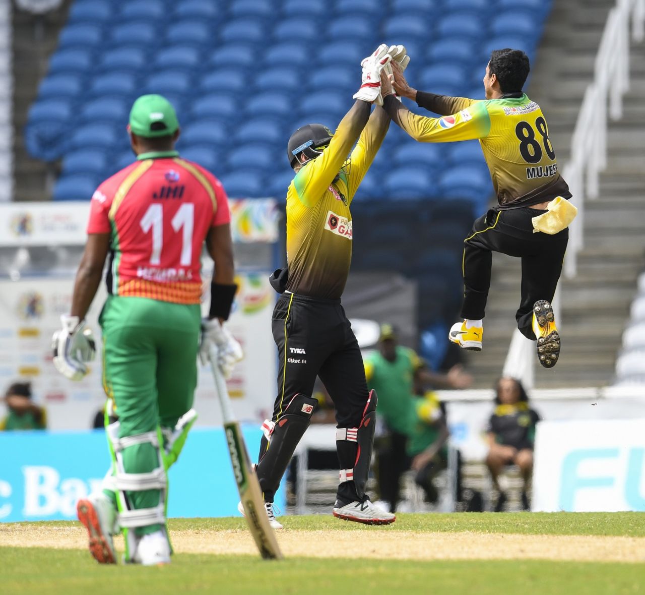 Mujeeb Ur Rahman leaps in joy after dismissing Shimron Hetmyer, Guyana Amazon Warriors v Jamaica Tallawahs, CPL 2020, Brian Lara Stadium, August 22, 2020