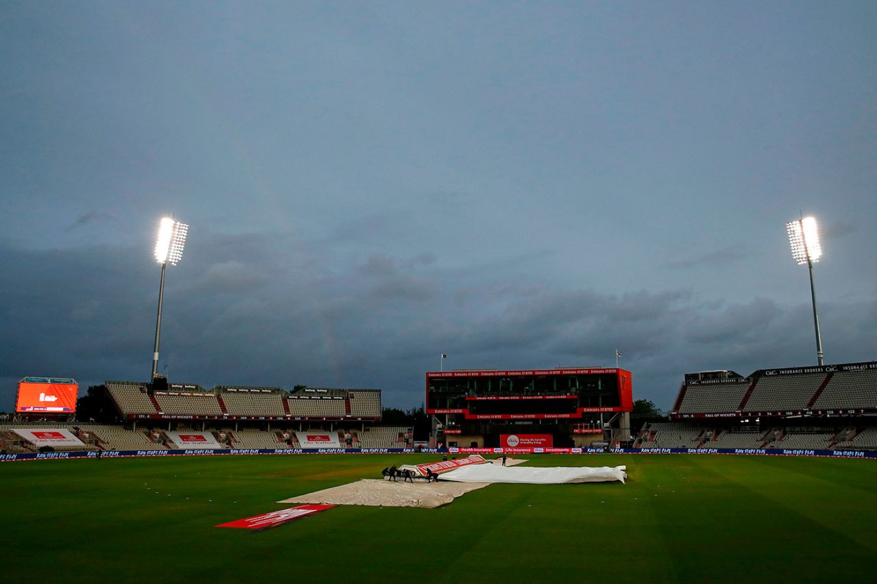 The covers come out at a soggy Old Trafford, England v Pakistan, 1st T20I, Old Trafford, August 28, 2020