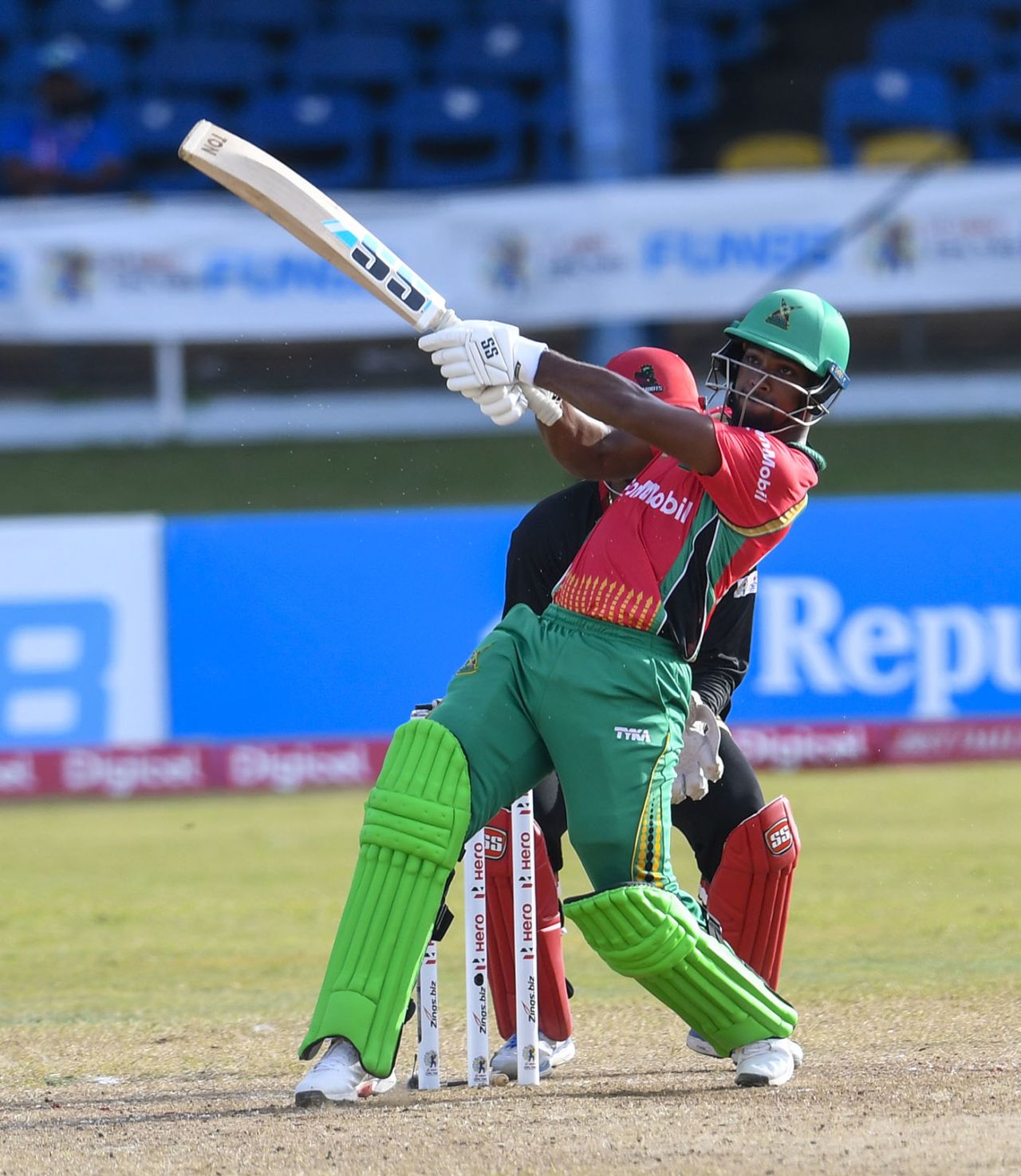 Nicholas Pooran frees his arms, Guyana Amazon Warriors v St Kitts and Nevis Patriots, Port-of-Spain, CPL 2020, August 30, 2020