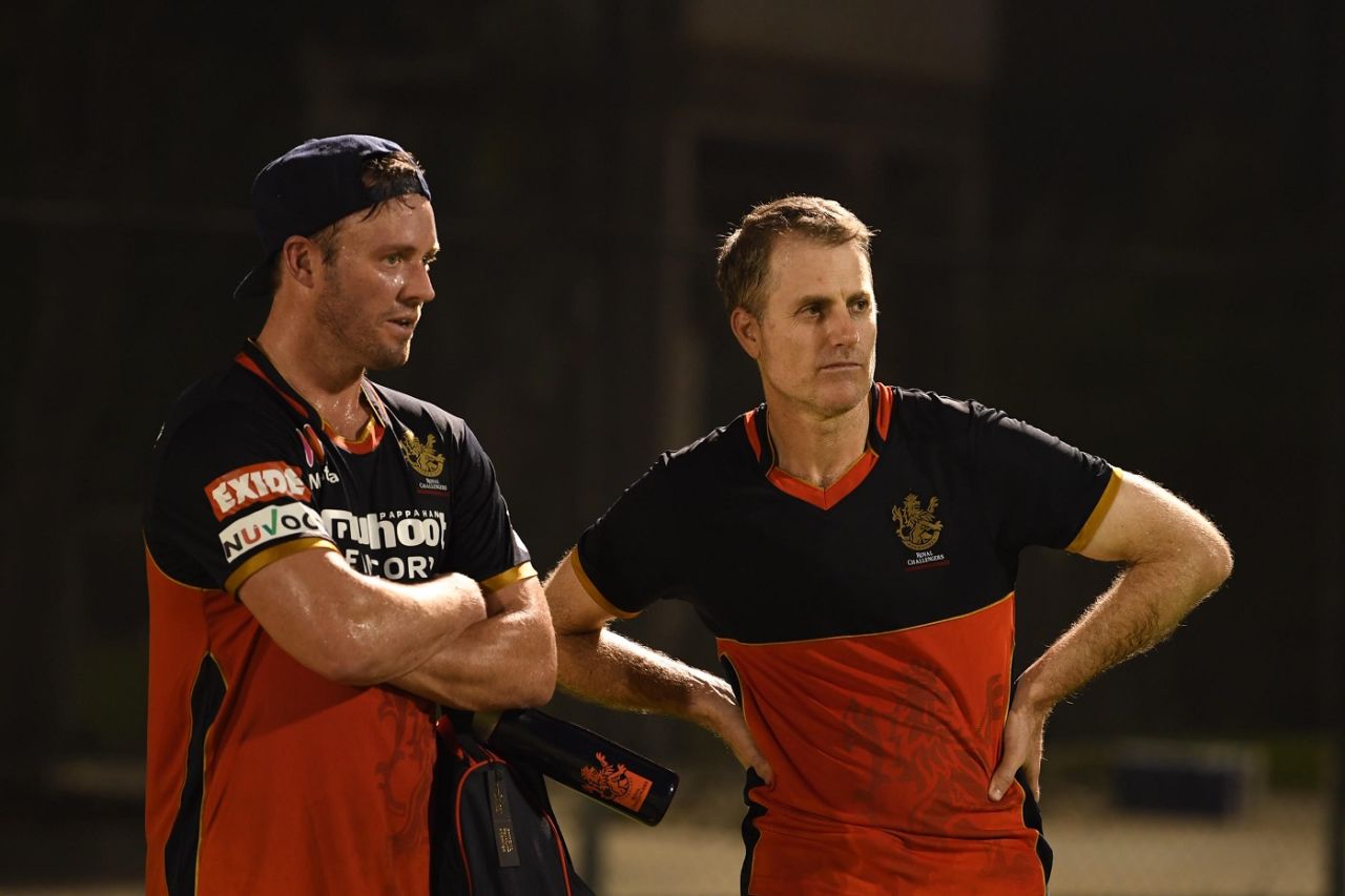 AB de Villiers keeps an eye on the Royal Challengers Bangalore training session with head coach Simon Katich, Dubai, August 30, 2020