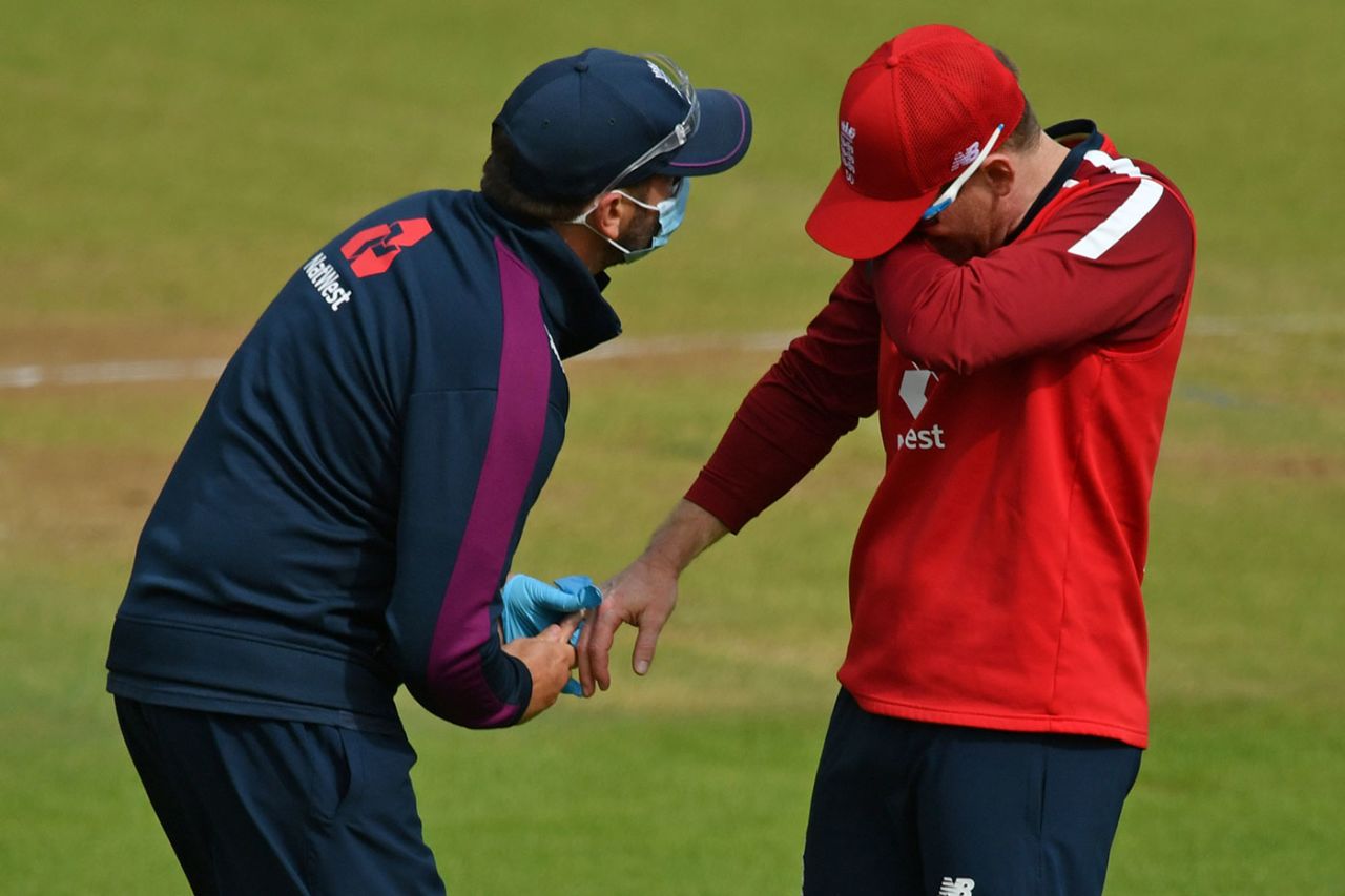 Eoin Morgan gets treatment for a finger injury, England v Australia, 2nd T20I, Southampton, September 6, 2020