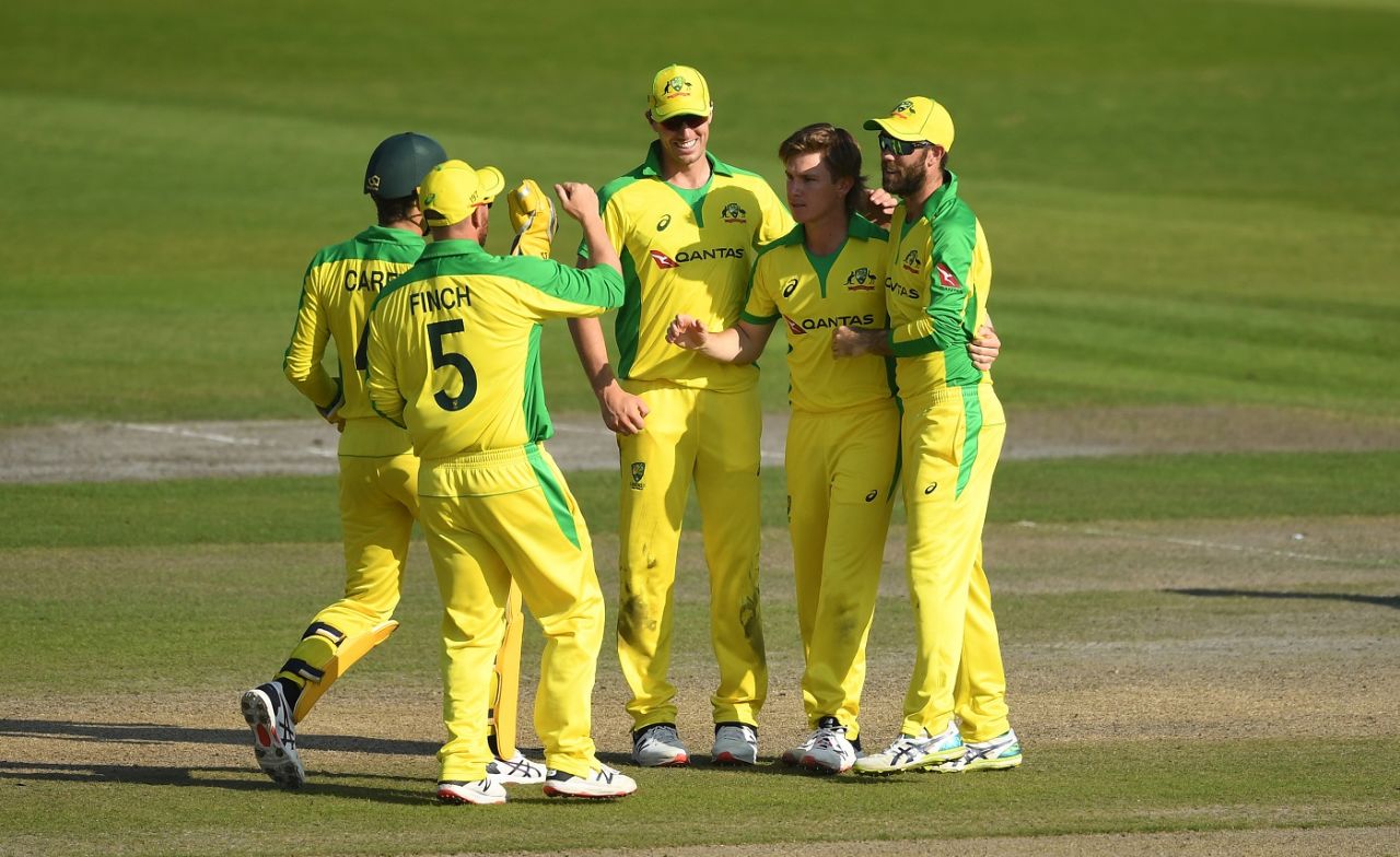 Alex Carey, Aaron Finch, Pat Cummins and Glenn Maxwell gather around Adam Zampa after yet another wicket, 2nd ODI, England v Australia, at Emirates Old Trafford, September 13, 2020
