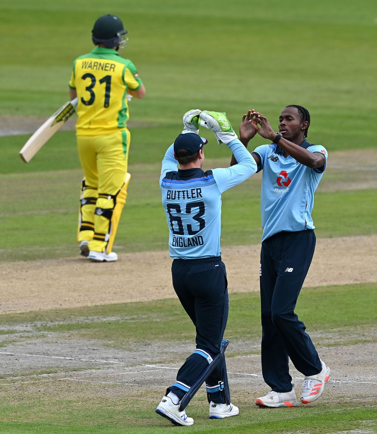 Jos Buttler and Jofra Archer exchange high fives, England v Australia, 1st ODI, Old Trafford, September 11, 2020