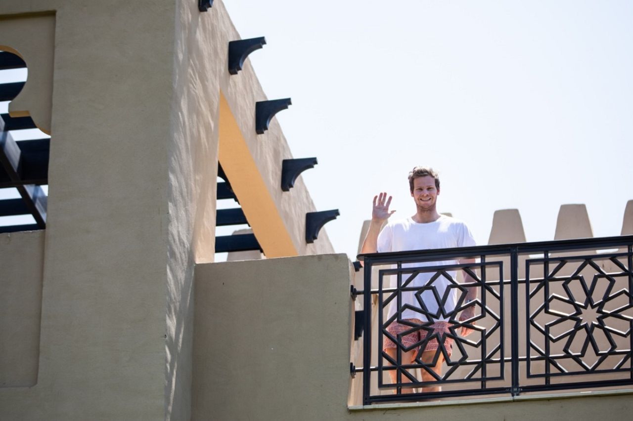 Steven Smith waves from the hotel balcony, Dubai, September 18, 2020