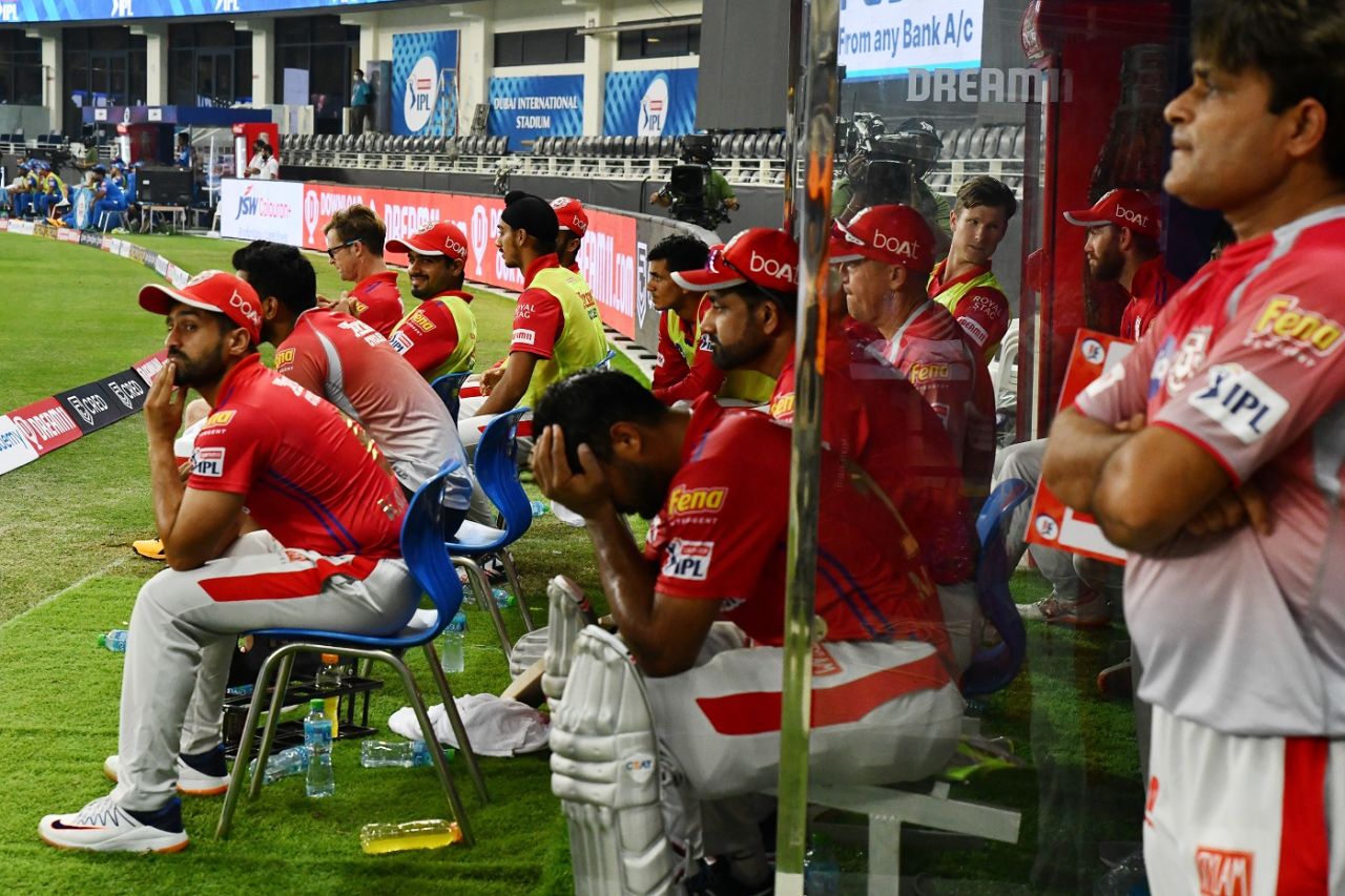 The Kings XI Punjab players wear dejected faces in the dugout , Delhi Capitals v Kings XI Punjab, IPL 2020, Dubai, September 20, 2020