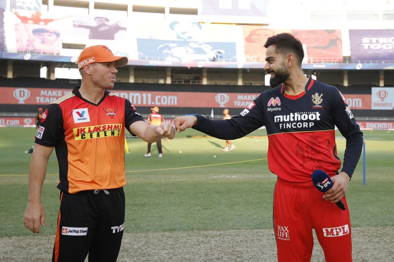David Warner and Virat Kohli bump fists at the toss, Sunrisers Hyderabad v Royal Challengers Bangalore, IPL 2020, Dubai, September 21, 2020 