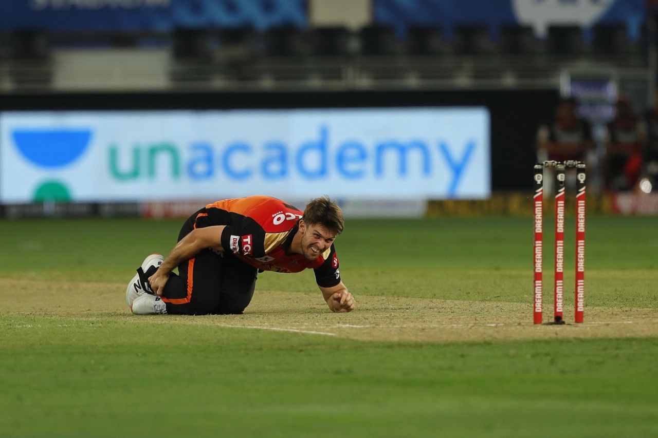 Mitchell Marsh clutches his ankle after taking a tumble, Sunrisers Hyderabad v Royal Challengers Bangalore, IPL 2020, Dubai, September 21, 2020 